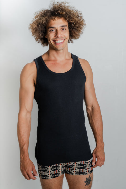 Male model promoting Reer Endz eco-conscious black singlet