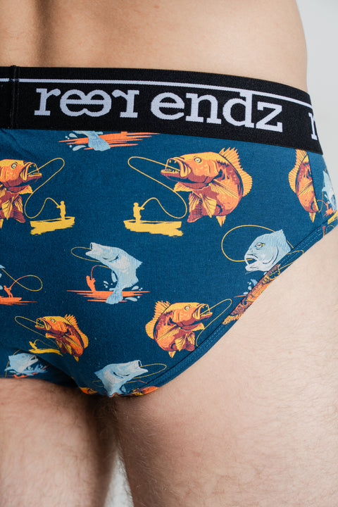 Our male model presents Reer Endz men's briefs in the fashionable Hooked Print, highlighting the superior comfort and eco-friendly nature of Organic Cotton.