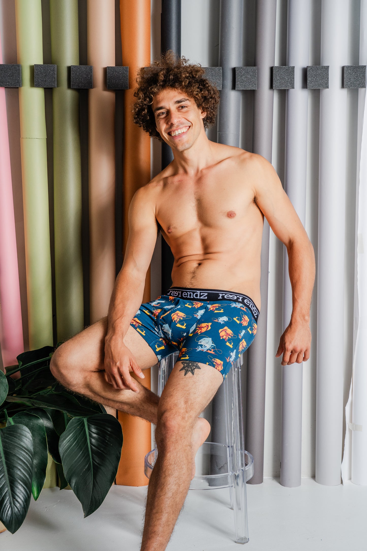 Eco-friendly Reer Endz men's trunks showcased by a male model, highlighting the stylish Hooked Print, all in Organic Cotton for exceptional comfort.