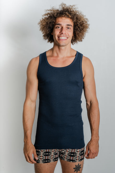 Male model promoting Reer Endz eco-conscious navy singlet