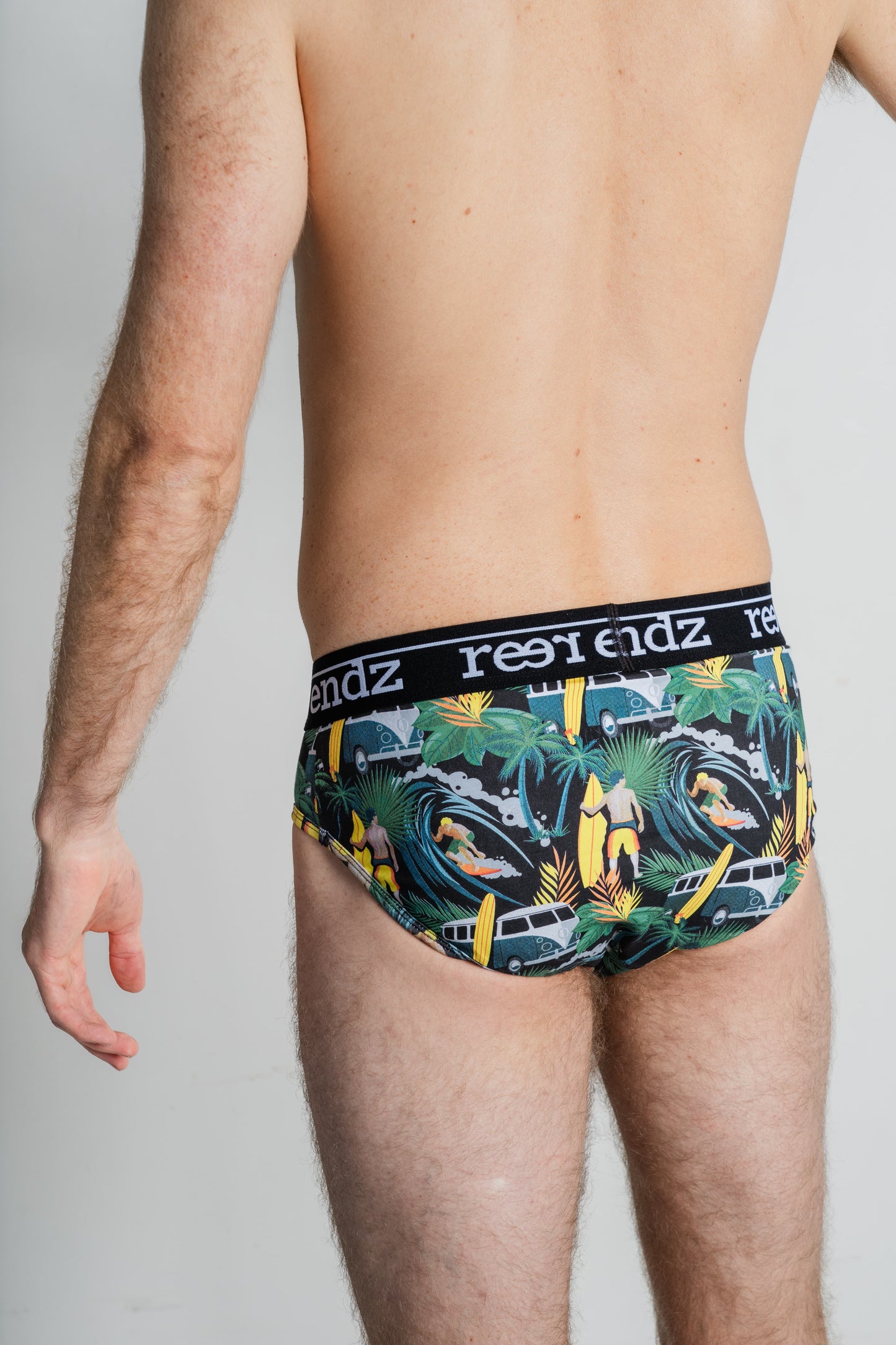 Male model in Reer Endz men's briefs – the chic Offshore Vibes Print crafted from eco-friendly Organic Cotton for ultimate comfort.