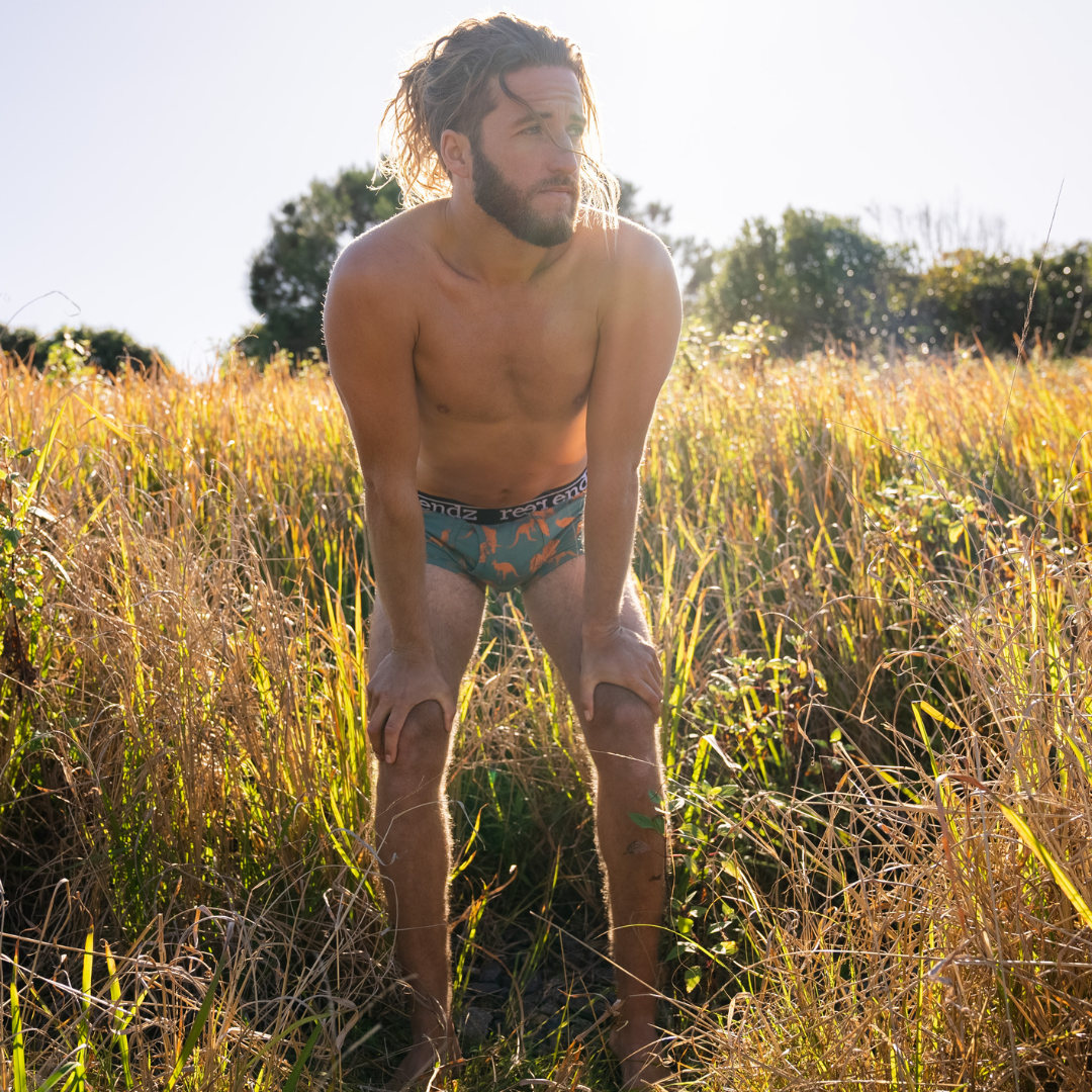 Organic cotton mens underwear by reer Endz. Kangaroo print shot on model in fields of Australia