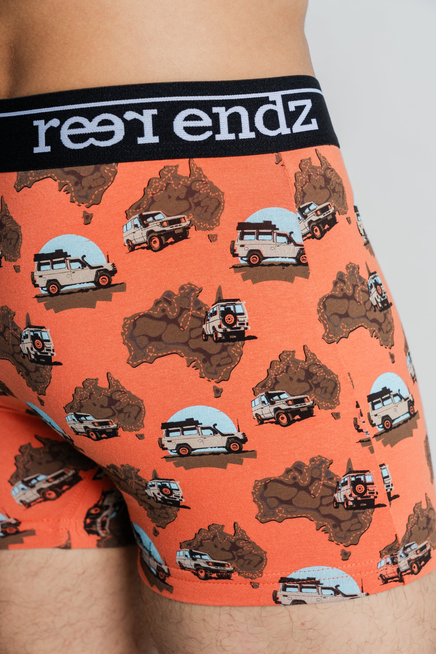 Our male model presents Reer Endz men's trunks in the fashionable Cruisin' Print, emphasizing the superior comfort and eco-consciousness of Organic Cotton
