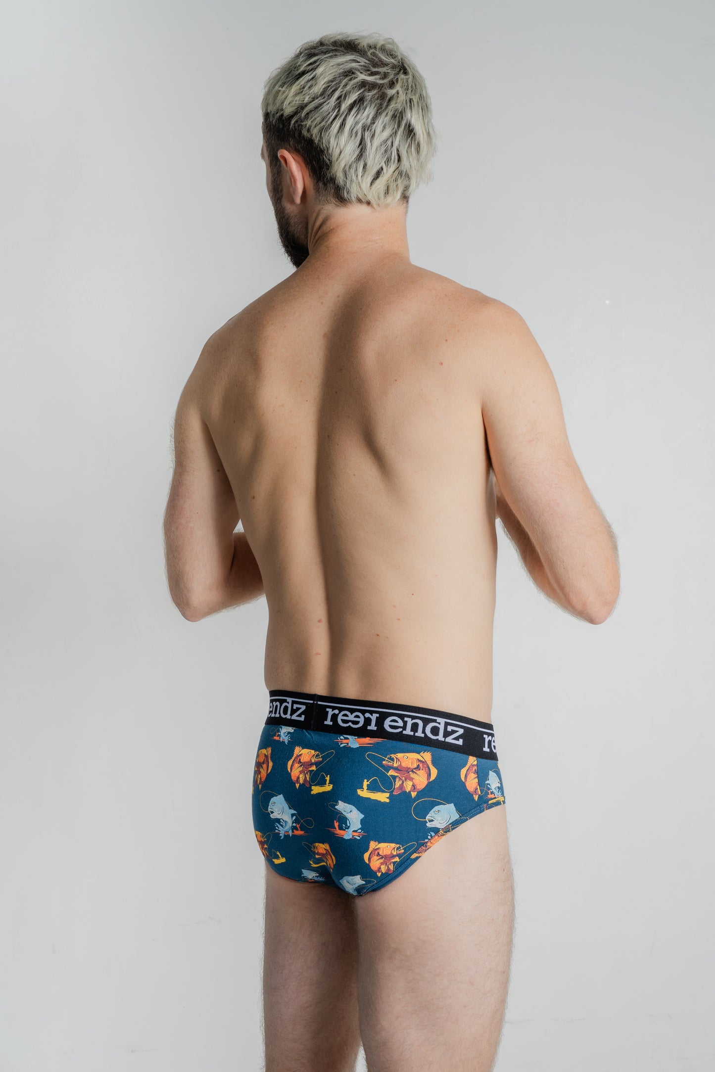 Experience comfort and sustainability with Reer Endz men's briefs in the trendy Hooked Print, expertly crafted from Organic Cotton, as seen on our male model.
