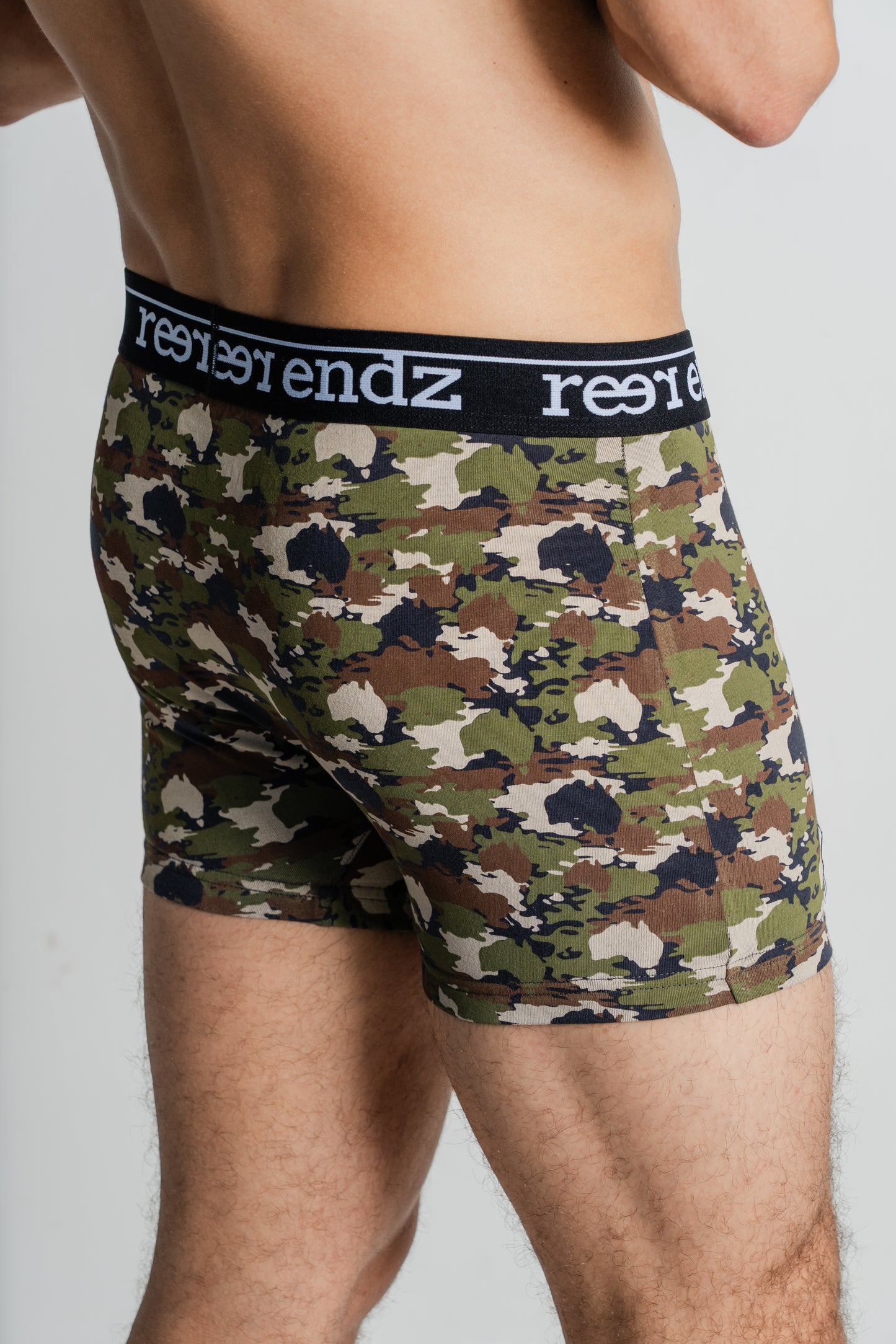 Discover the stylish Incognito Print in Reer Endz men's trunks, as showcased by a male model. Experience unbeatable comfort with Organic Cotton.