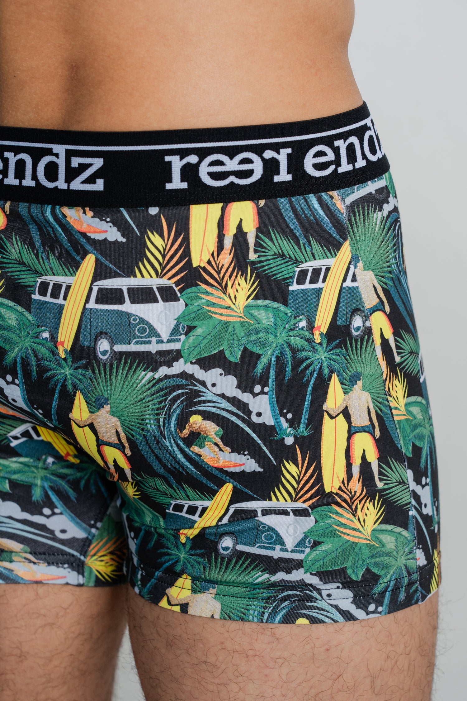 Eco-conscious fashion: Male model flaunts Reer Endz men's trunks in the stylish Offshore Vibes Print, designed for unmatched comfort, thanks to Organic Cotton